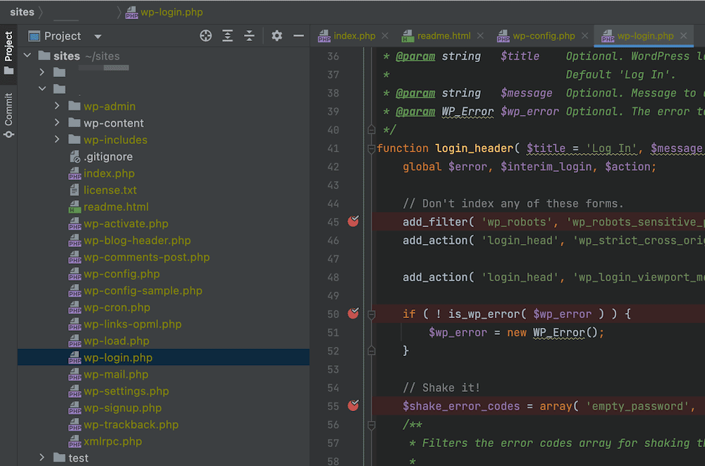 PhpStorm 界面特写,左侧为树形目录,右侧为编码面板。在编辑器的排水沟中,在第 45、50 和 55 行有带白色刻度的红点。这些是用于调试的断点。