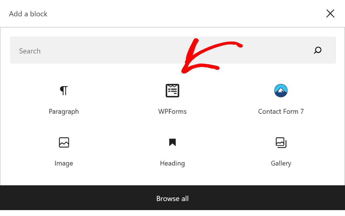 Red arrow pointing to WPForms block