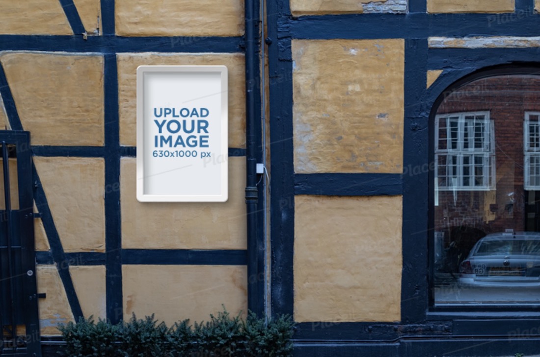 mockup di poster con un muro in stile blocco consumato