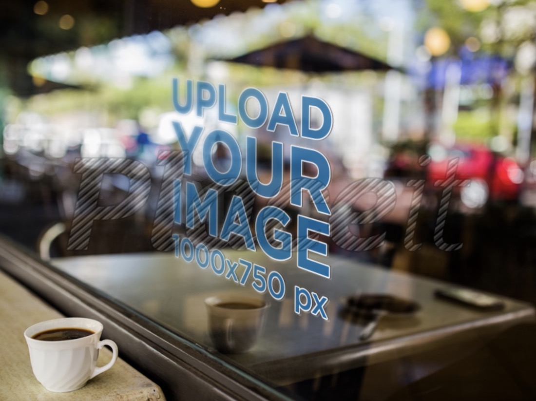 mockup di una vetrofania con una tazza di caffè