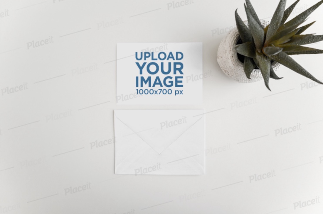 maquette d'une carte postale et d'une enveloppe avec une plante du désert