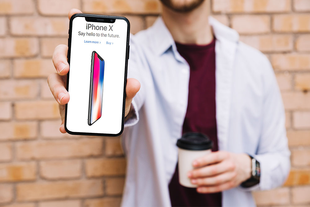 iphone x mockup in mano maschile